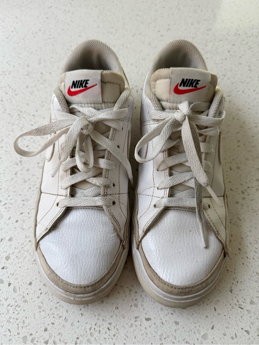 Nike Women’s White Sneakers with Red Swoosh
